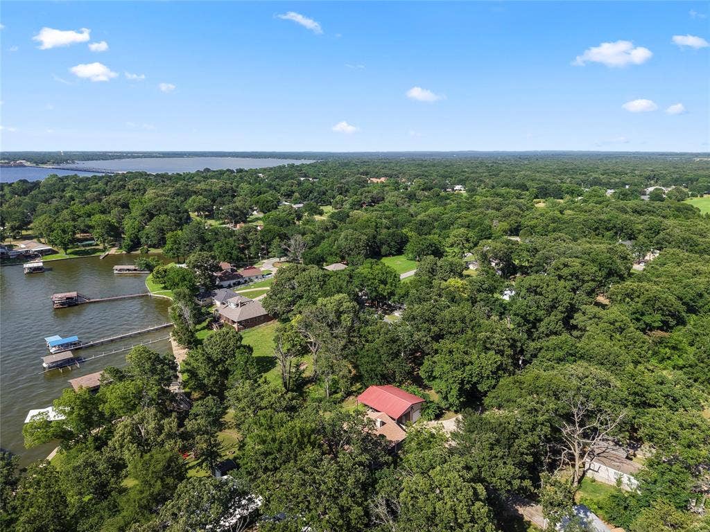 323 Dyer Circle, Payne Springs, TX 75156 Aerial perspective showcasing a broad expanse of water
