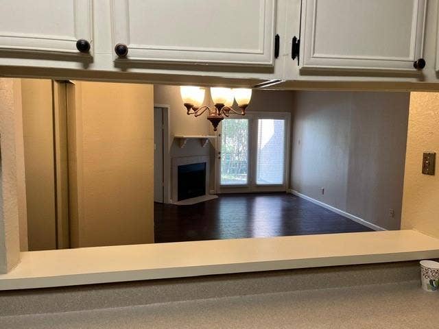 5550 Spring Valley Road, #F15, Dallas, TX 75254 view of living from kitchen