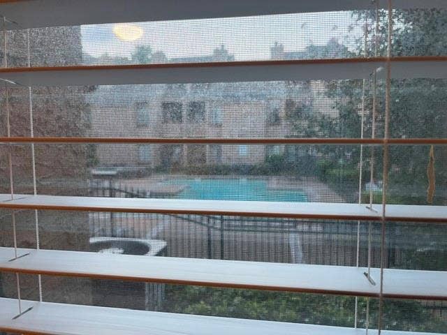 5550 Spring Valley Road, #F15, Dallas, TX 75254 view of pool from window