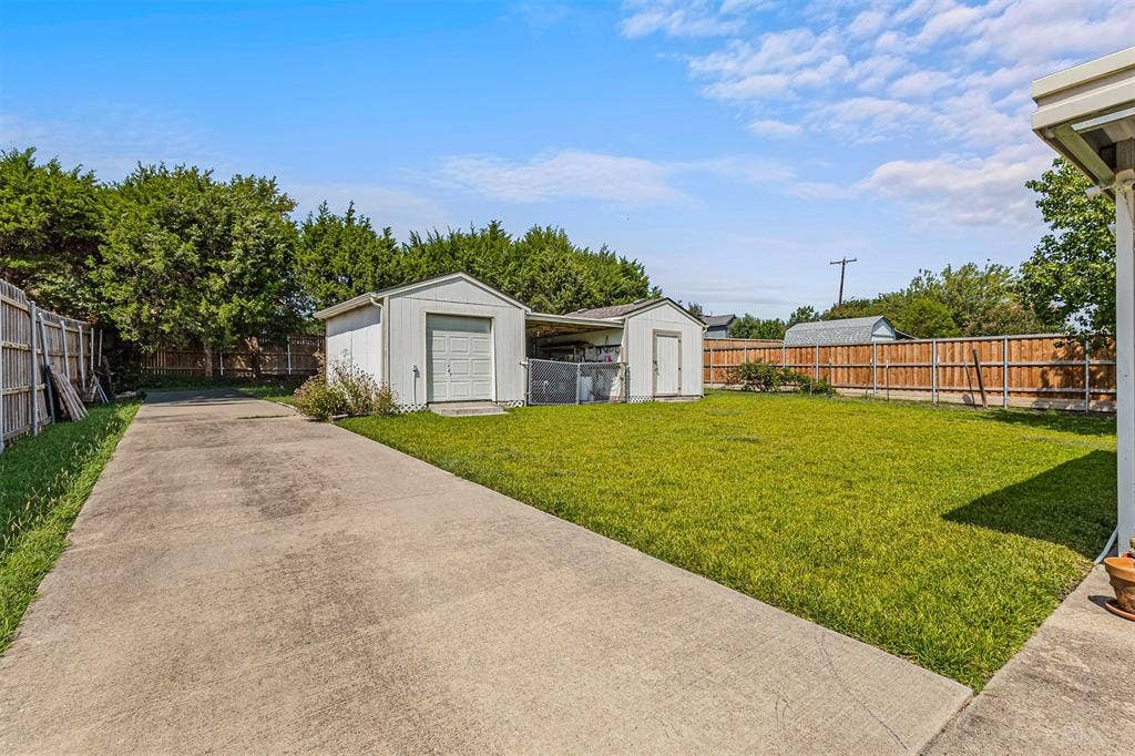 1409 Osage Trail, Mesquite, TX 75149 Double ended shop with roll up door