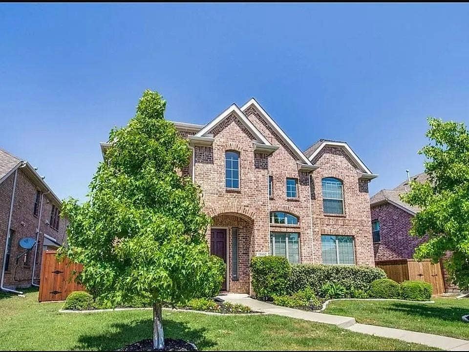 13990 Stevens Point Drive, Frisco, TX 75033 Traditional brick facade featuring multiple gables and arched windows