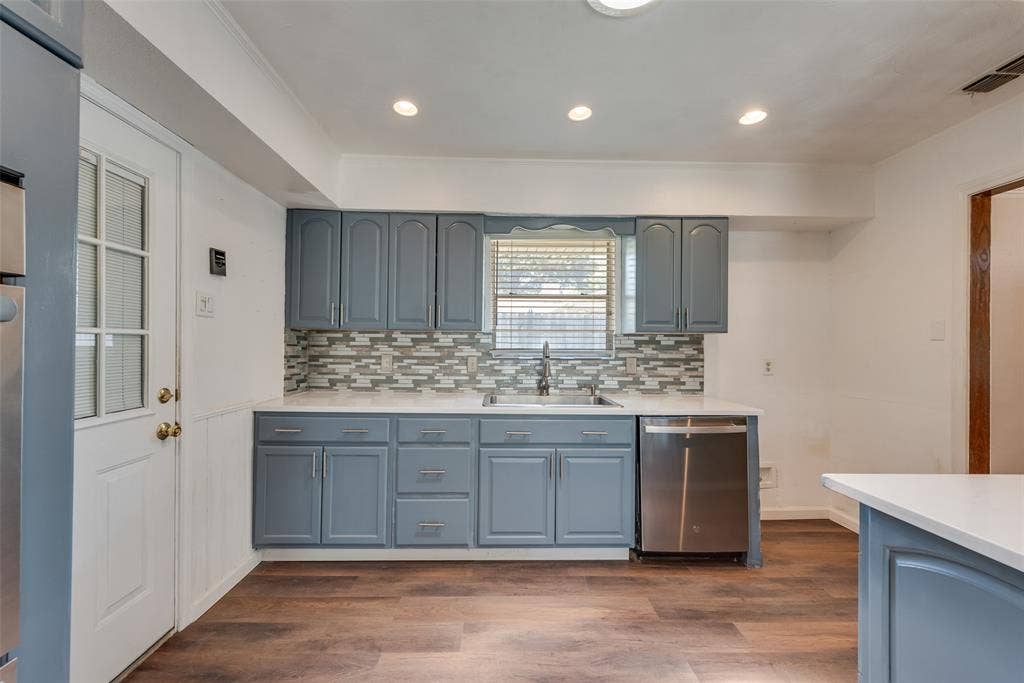 Upgraded kitchen with decorative lighting