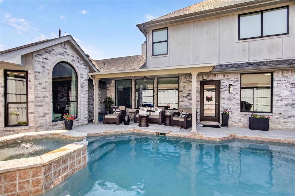 4243 Millview Lane, Dallas, TX 75287 Pool can be seen from almost every room in the house. 2023 All new vinyl low E windows installed (entire home) 2023 Installed glass break sensors security season.