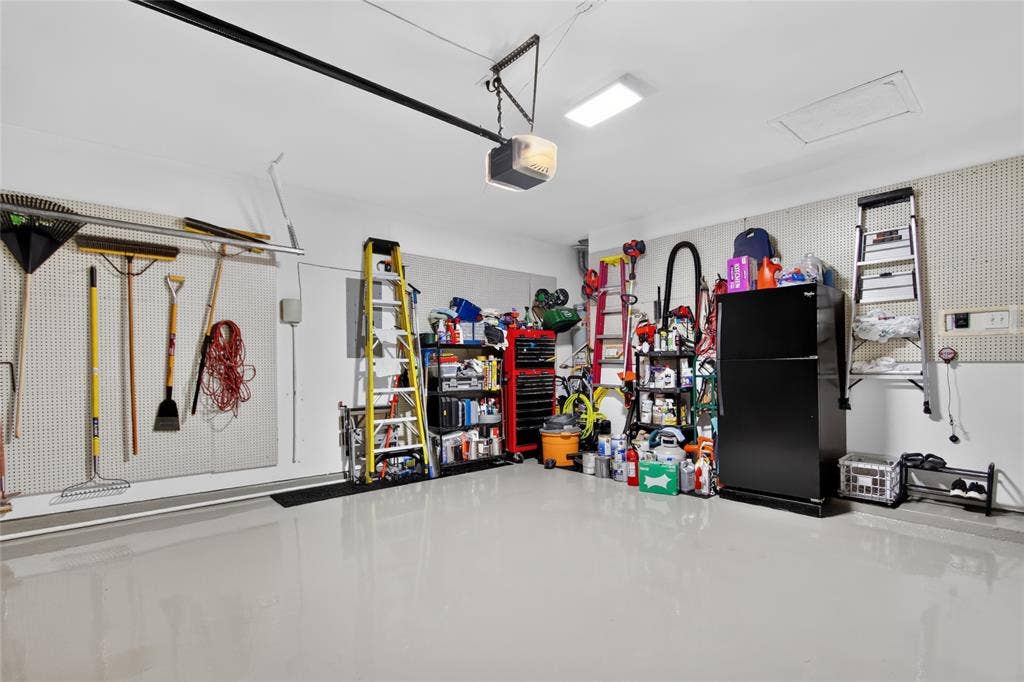 4243 Millview Lane, Dallas, TX 75287 You could Eat off the Floor...seriously I want this garage. Epoxy floor redone in 2017, wall holders for all your tools and yard supplies. Plenty of space for everything and 2 Cars. Garage is at the rear of the home. New gas water heater installed in 2026. Very Impressive