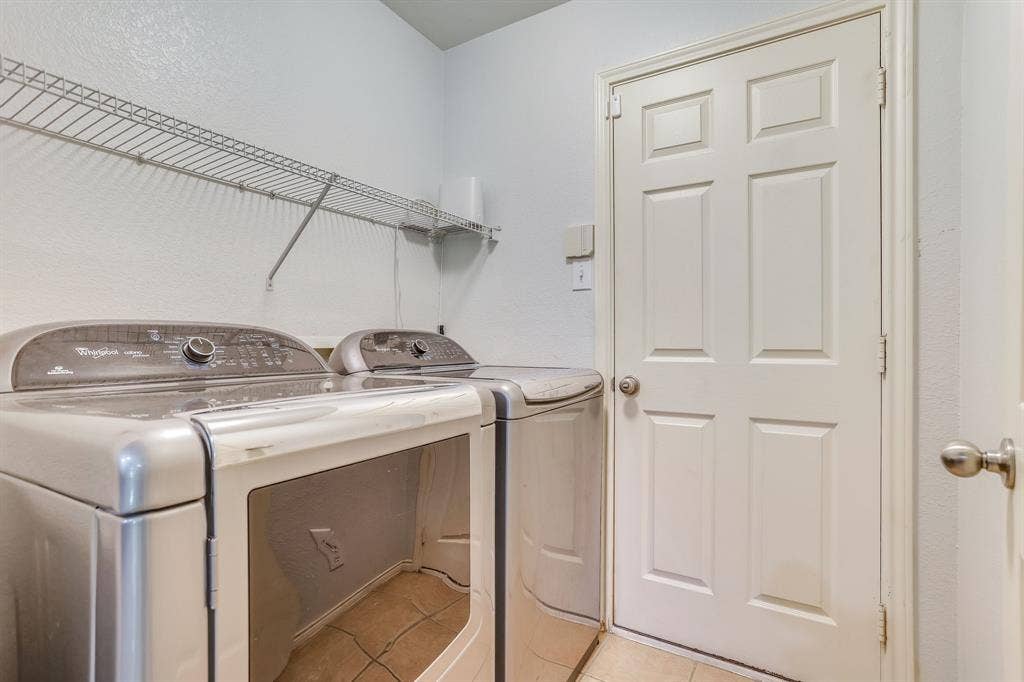 613 Cessna Court, Saginaw, TX 76179 Separate utility room leads to garage. Whirlpool Washer and Dryer Convey with property