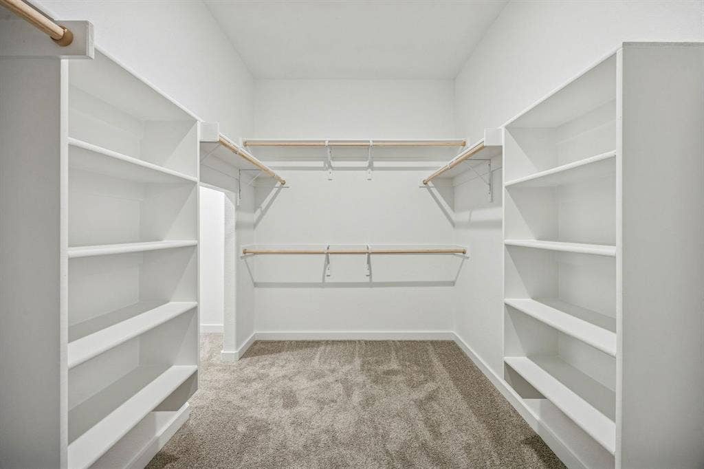 1860 Balfour Bend, Forney, TX 75126 Primary Closet in the Wimbledon home plan by Trophy Signature Homes – REPRESENTATIVE PHOTO