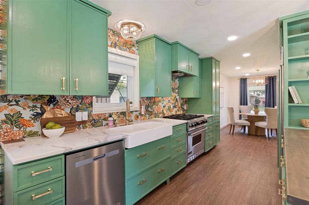 Apron sink, new dishwasher and Viking 6 burner gas range and oven
