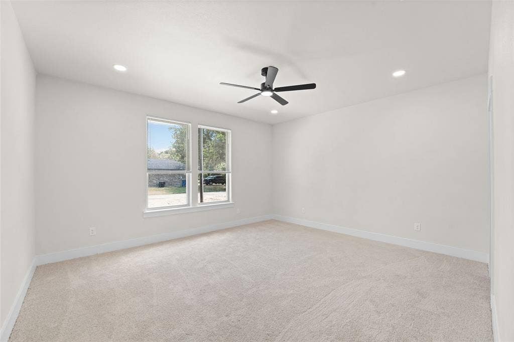 609 Luzon Street, Tool, TX 75143 Light-filled room featuring plush carpet flooring, recessed lighting, and a contemporary ceiling fan