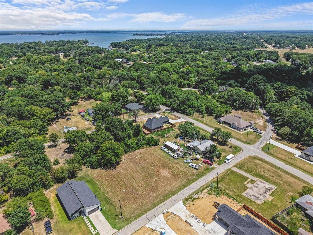 609 Luzon Street, Tool, TX 75143 Aerial perspective showcasing a residential area with varied lot sizes