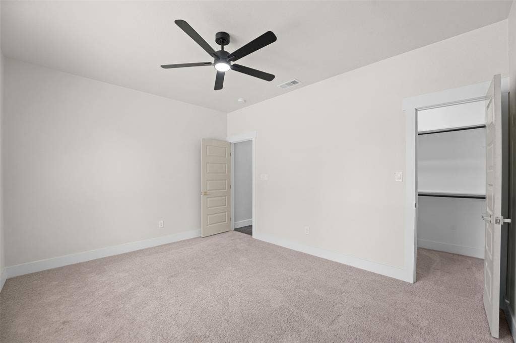 609 Luzon Street, Tool, TX 75143 Neutral-toned carpeting throughout