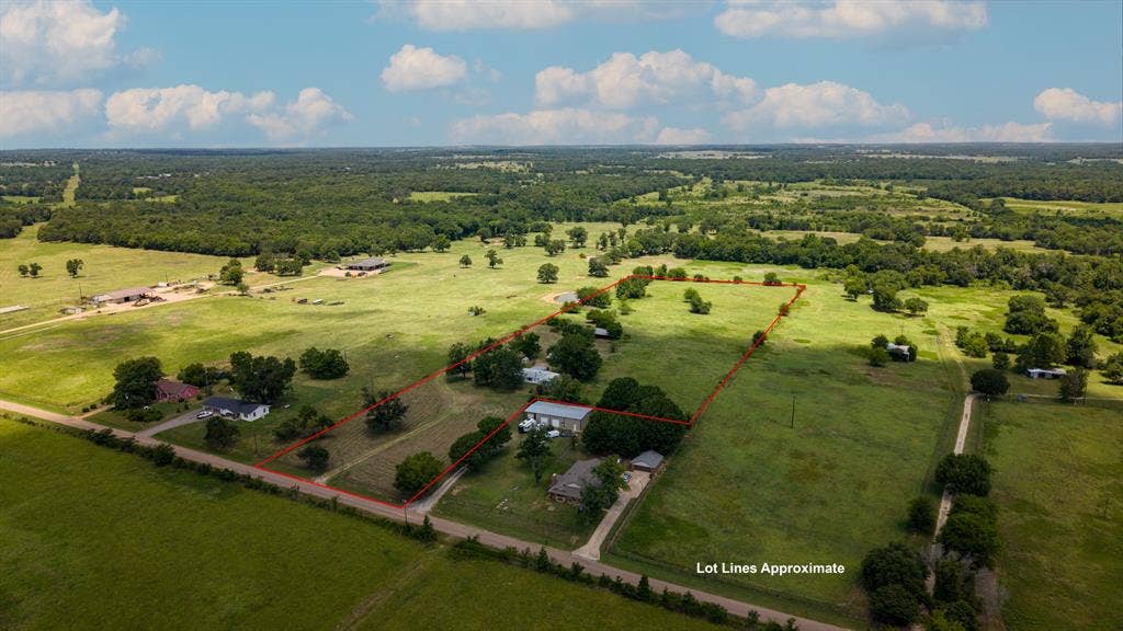 1053 Vz County Road 4206, Athens, TX 75752 Expansive rural acreage featuring several structures, mature trees, and open fields