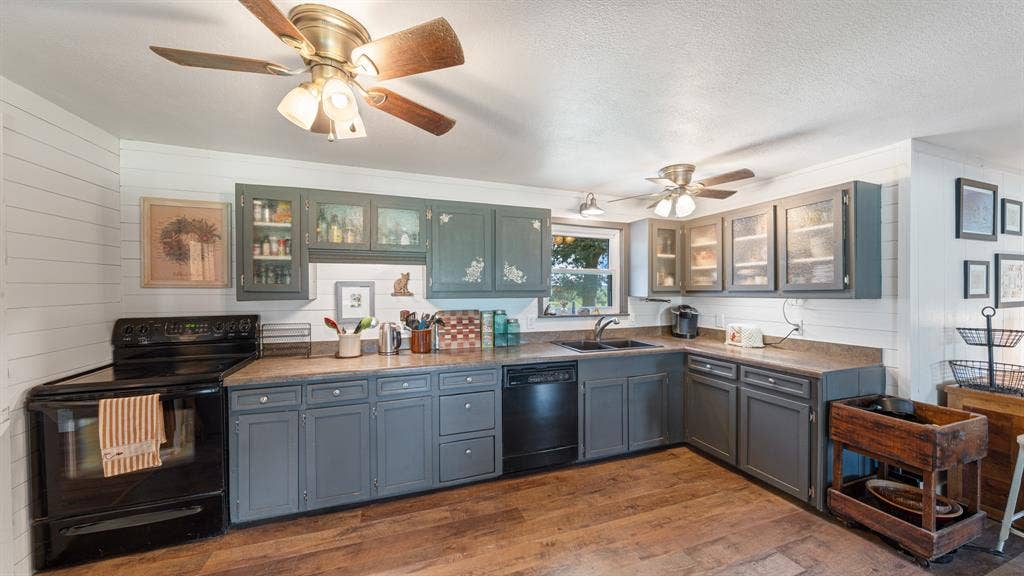 1053 Vz County Road 4206, Athens, TX 75752 Kitchen featuring wood-finish flooring and a white shiplap wall