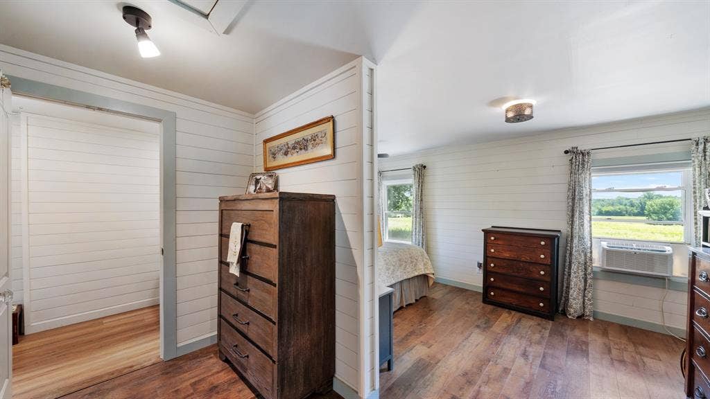 1053 Vz County Road 4206, Athens, TX 75752 Room featuring wood-finish flooring, white shiplap walls, and a white ceiling
