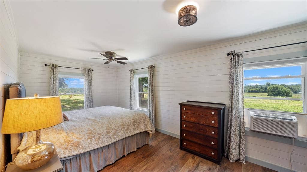 1053 Vz County Road 4206, Athens, TX 75752 Bright room with wood-finish flooring and white shiplap walls