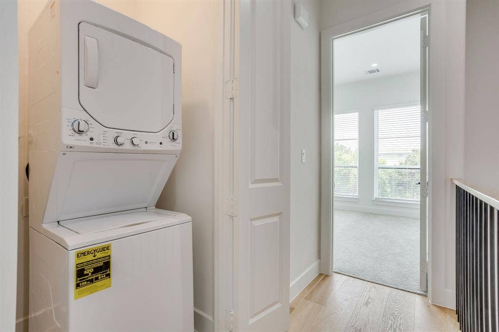 123 Thornton Street, Arlington, TX 76013 Stackable laundry appliances integrated into the hallway