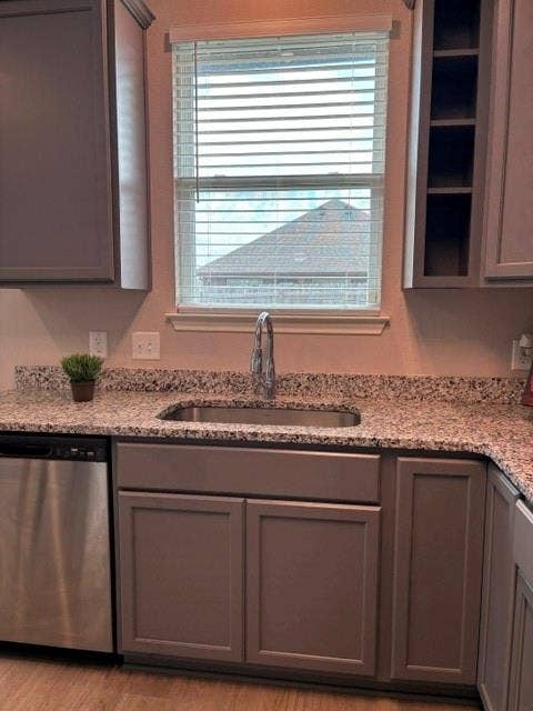 4053 Centerfire Road, Waco, TX 76705 Stainless sink and dishwasher overlook backyard
