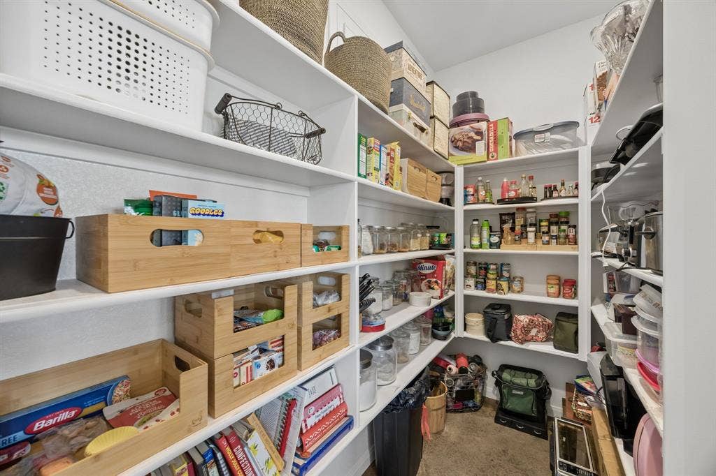 12961 County Road 574, Farmersville, TX 75442 Floor to ceiling pantry shelving with room for all your kitchen appliances and more.