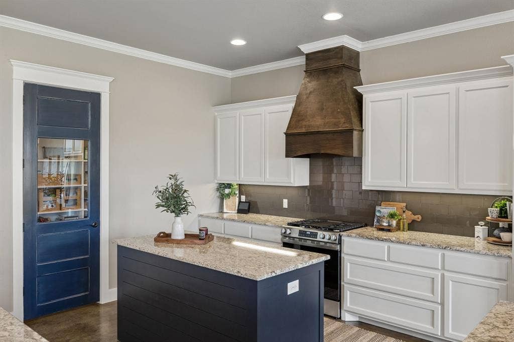 12961 County Road 574, Farmersville, TX 75442 Blue door leads to oversized pantry