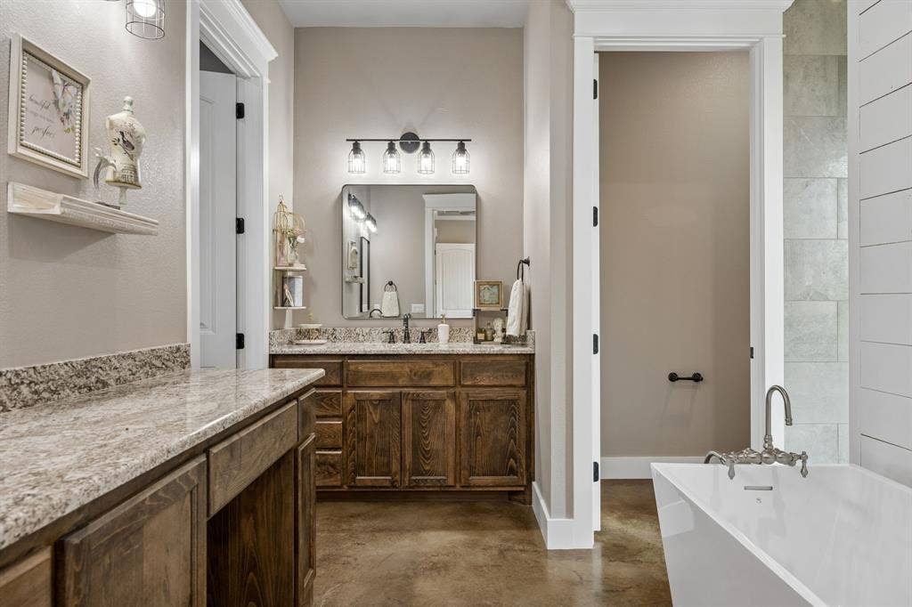 12961 County Road 574, Farmersville, TX 75442 door on the left leads to a massive walk-in closet which connects to laundry