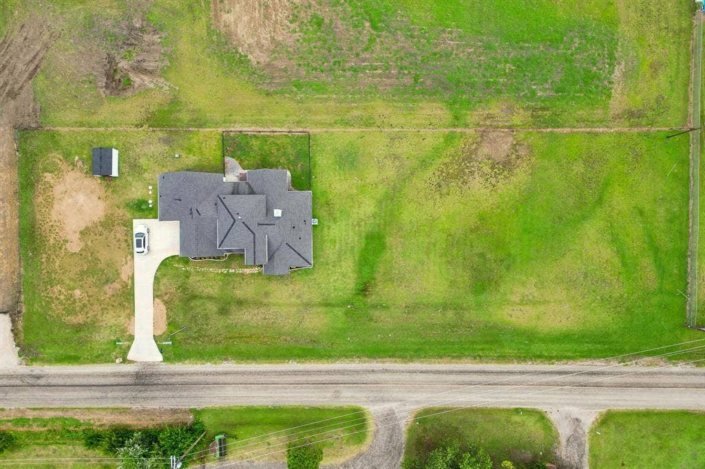 12961 County Road 574, Farmersville, TX 75442 Imagine your dream outdoor leaving space on this blank canvas. The majority of the property is side yard as you can see here. Small fenced area is primarily meant for a dog run