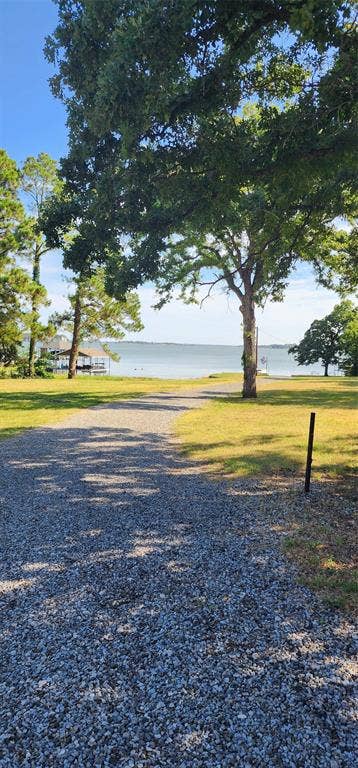 TBD Lot 282 Lide Lane, Tool, TX 75143 Road down to the lake at the Westwood Beach POA gated park. Join the voluntary POA to gain access to the boat ramp, park, and pier. Life is Better at the Lake.