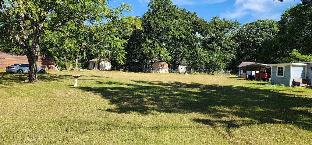 TBD Lot 282 Lide Lane, Tool, TX 75143 Expansive grass lot bordered by mature trees. Ready to build? This is the lot for you - Lot 282 Lide Lane and Bradleys Bend in Westwood Beach at Cedar Creek Lake.