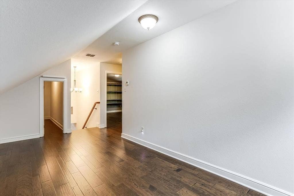 Hardwood-style flooring throughout