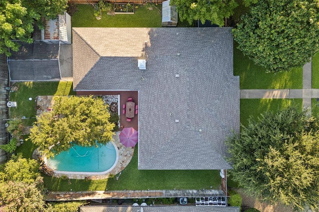 2104 Westlake Drive, Plano, TX 75075 Aerial perspective highlighting the property's exterior and expansive backyard
