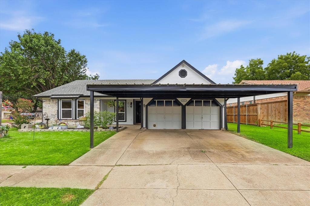 6572 Ridglea Drive, Watauga, TX 76148 Contemporary single-story residence featuring a carport and attached two-car garage