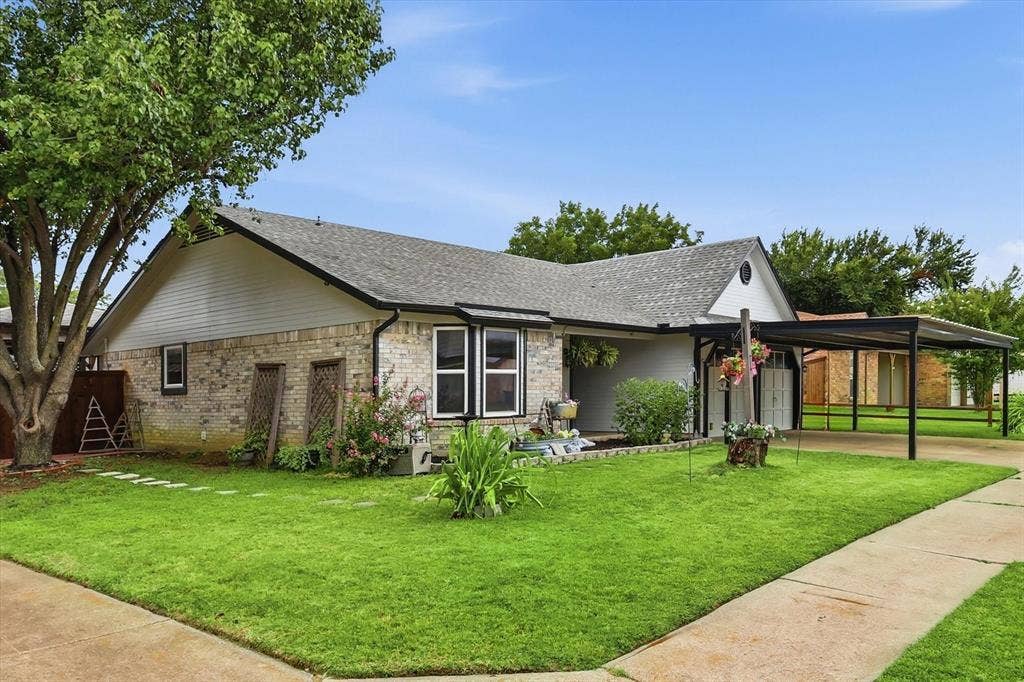 6572 Ridglea Drive, Watauga, TX 76148 Exterior featuring a brick facade, a shingle roof, and a mature tree