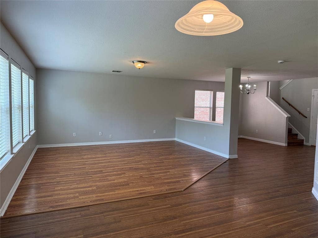 Living room open to kitchen and dining area