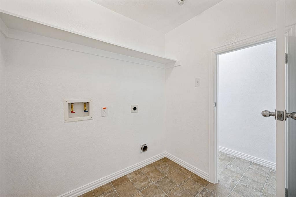 2113 Reston Drive, McKinney, TX 75072 Laudry room with extra large storage closet