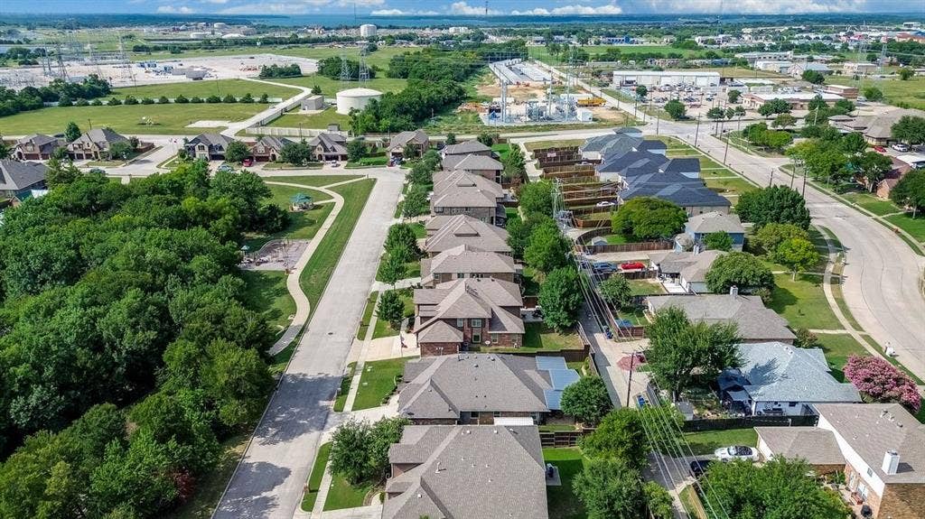 114 Lyndhurst Drive, Wylie, TX 75098 Aerial perspective showcasing residential properties with a mix of brick and siding exteriors