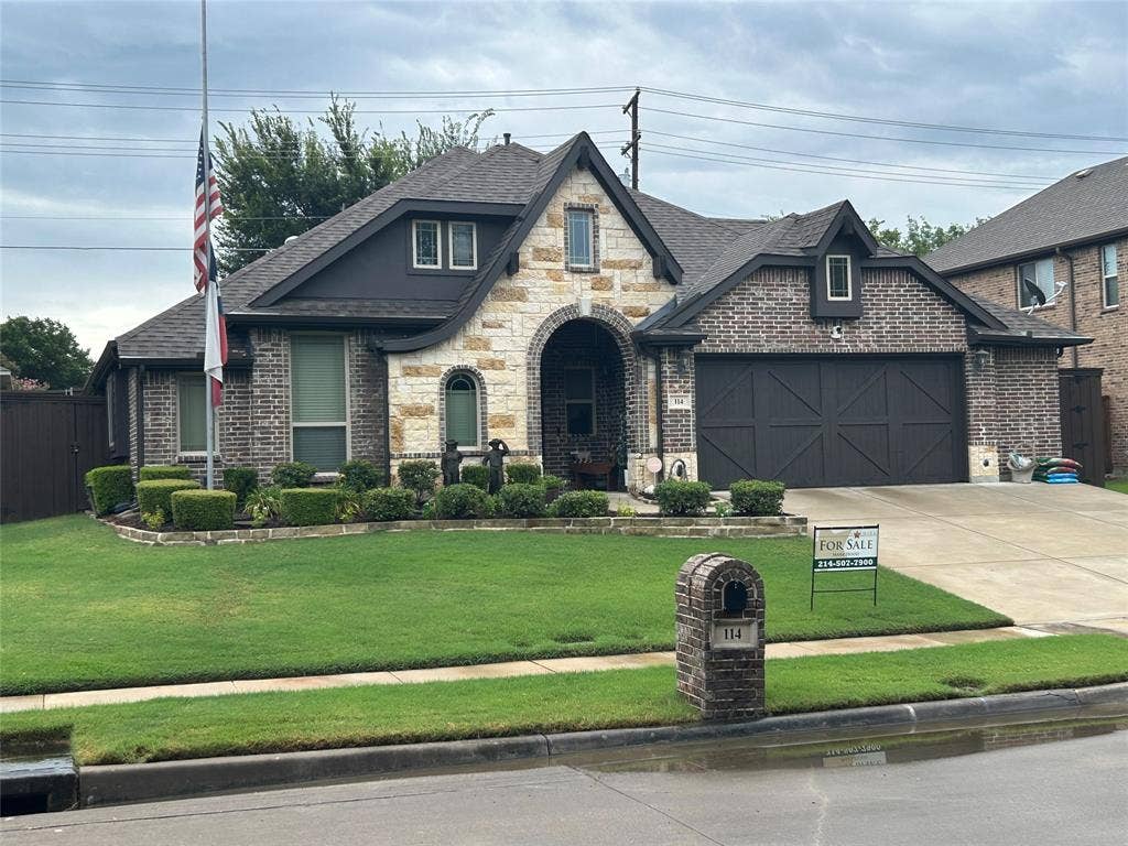 114 Lyndhurst Drive, Wylie, TX 75098 Stone and brick exterior with dark trim accents