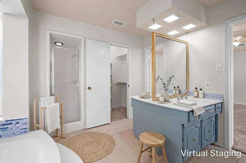 1315 Winding Brook Drive, DeSoto, TX 75115 Recessed lighting, enclosed shower, single vanity with countertop, framed mirror, and tile flooring