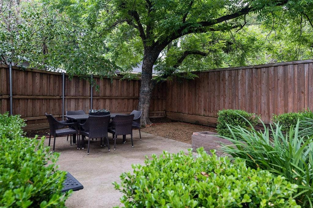 When the home was occupied the owners enjoyed this lovely dining space underneath the shade of a huge tree.