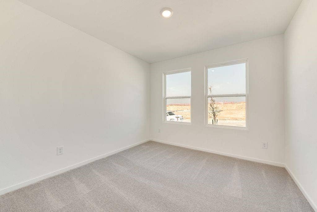 1271 Falcon Heights, Forney, TX 75126 Empty room with light carpet