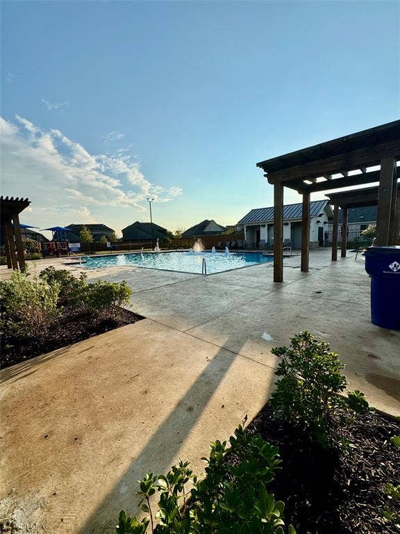 1271 Falcon Heights, Forney, TX 75126 Community pool with a pergola and a patio area