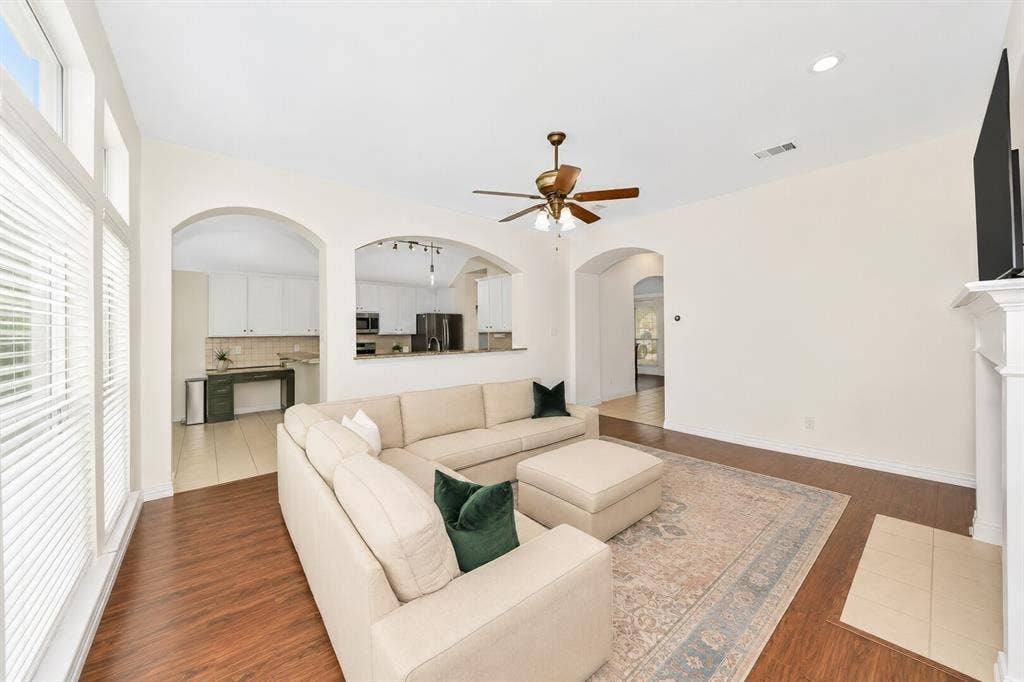 5304 Fox Run Drive, Watauga, TX 76137 Floor to ceiling windows flood the room with natural light!