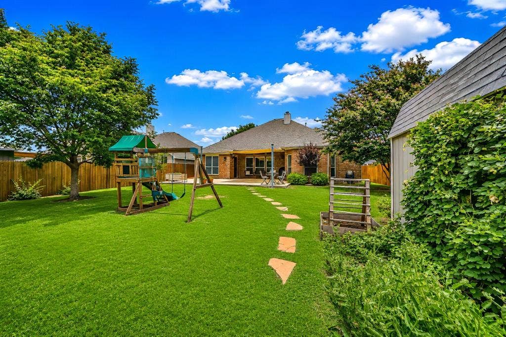 5304 Fox Run Drive, Watauga, TX 76137 Walk barefoot through the lush manicured lawn. Gaze at the mature trees. Grow something yummy in the raised garden beds. Or, simply relaxing in the Texas sunshine.