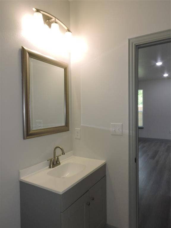 6110 Tejas Drive, Mabank, TX 75156 Bathroom vanity featuring a rectangular undermount sink, brushed nickel faucet, and a light-toned countertop
