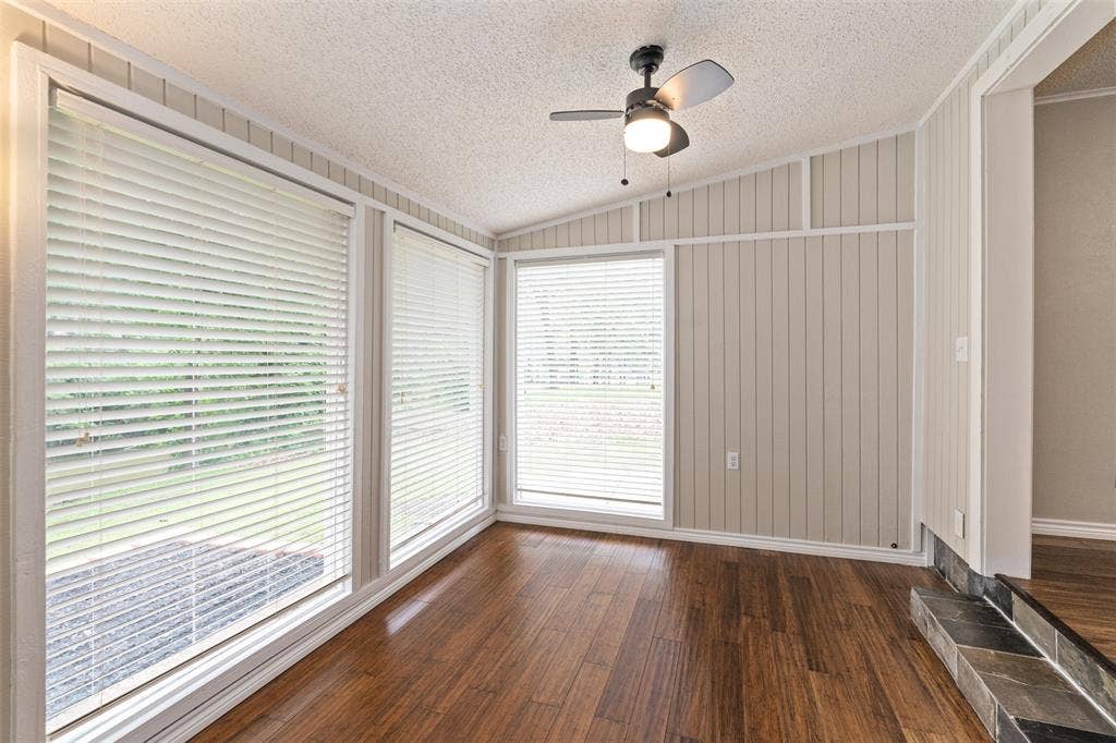 243 Shoreline Drive, Star Harbor, TX 75148 This Bonus space in the primary bedroom overlooks the water with floor to ceiling windows. It will be such a usable space for sitting area, office, exercise space, anything you want...