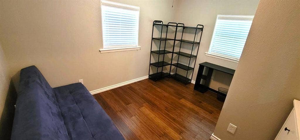 243 Shoreline Drive, Star Harbor, TX 75148 Furnished guest bedroom 1 with futon and small desk.