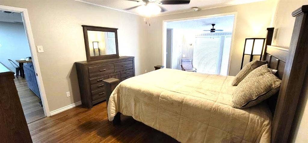 243 Shoreline Drive, Star Harbor, TX 75148 Furnished primary bedroom with attached sitting room.