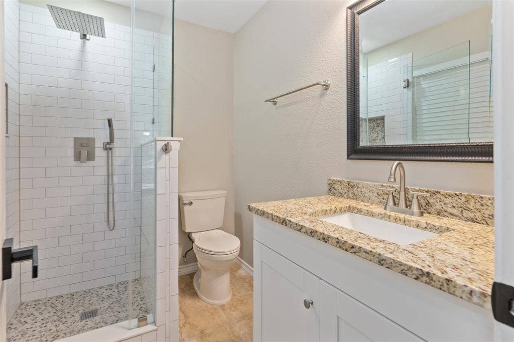 243 Shoreline Drive, Star Harbor, TX 75148 Updated bathroom, everything is fresh, and ready for you now.