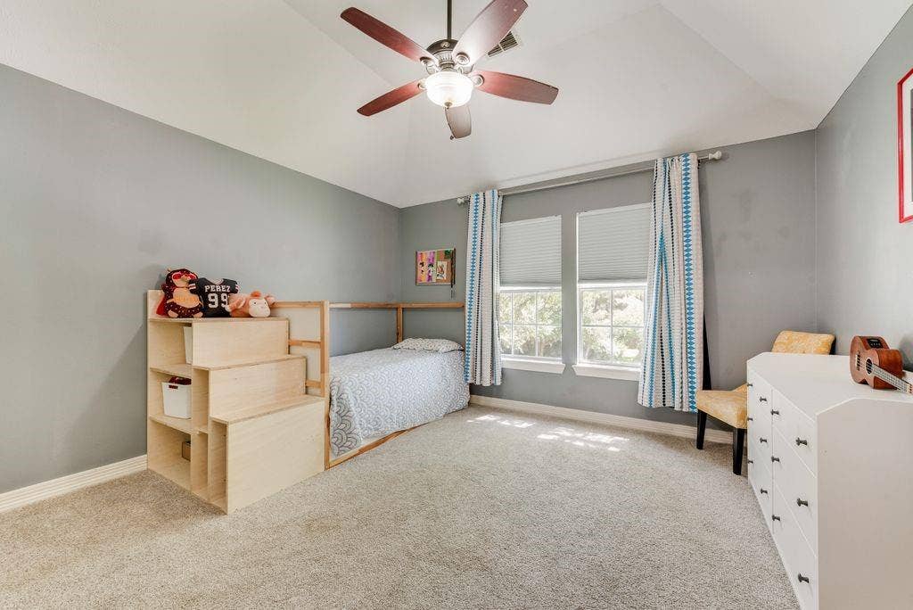One of three secondary bedrooms.