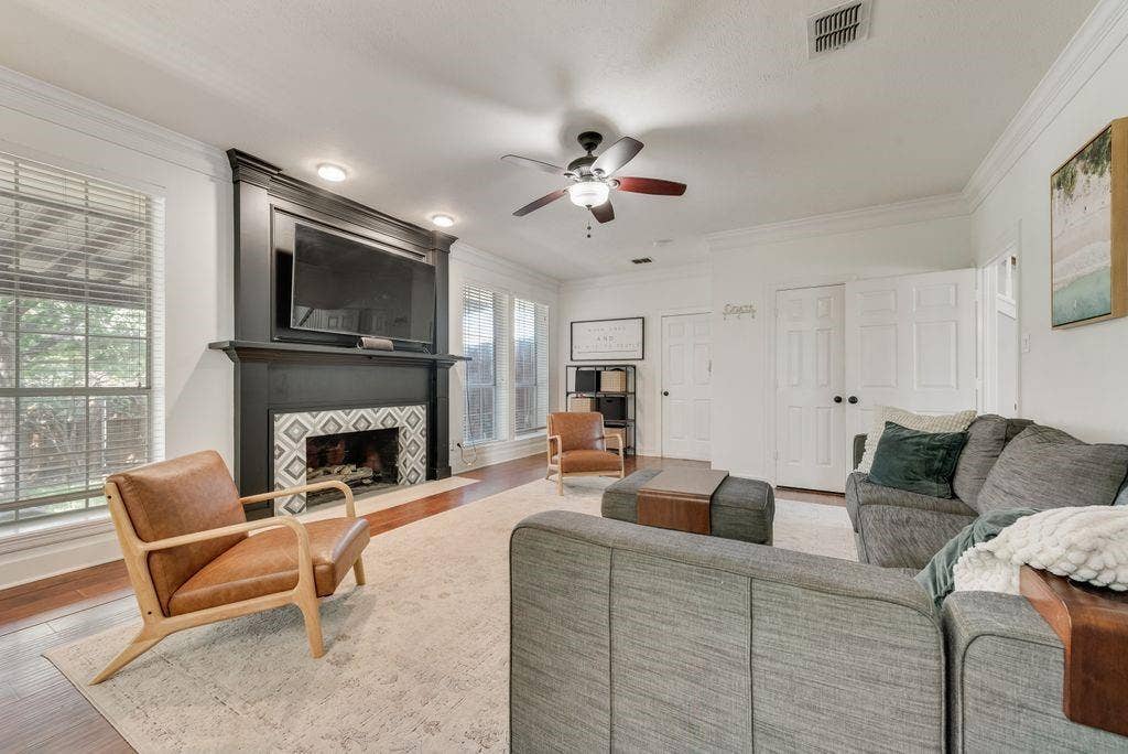 The fireplace surround was re-finished in 2022 to make  it a focal point of the family room.