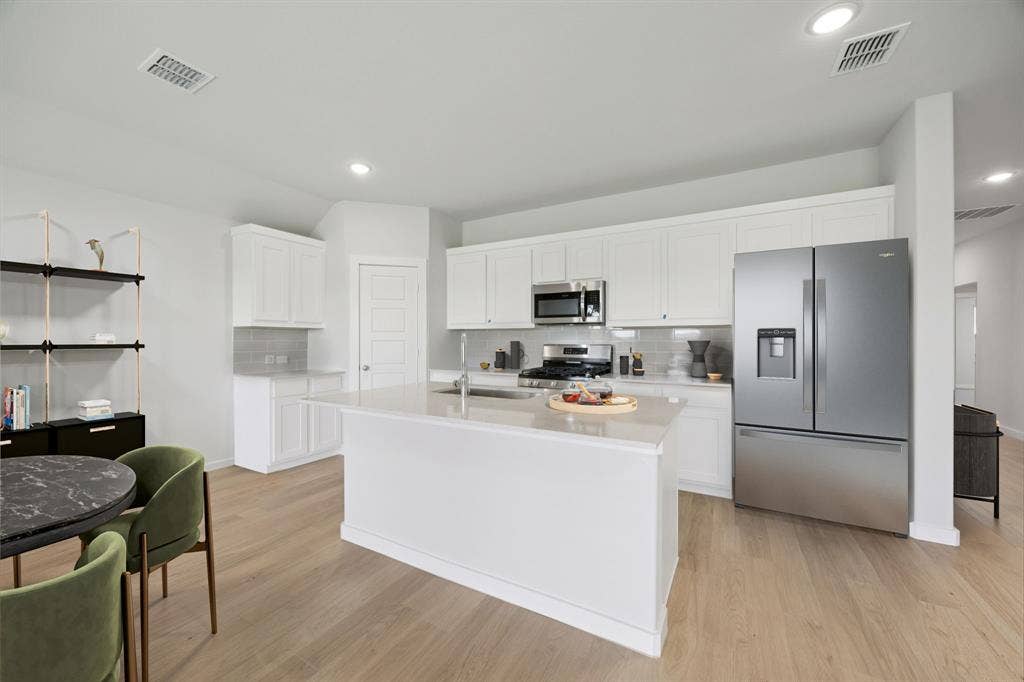 1936 Paddock Lane, Seagoville, TX 75159 Kitchen in the Hadley home plan by Trophy Signature Homes – REPRESENTATIVE PHOTO