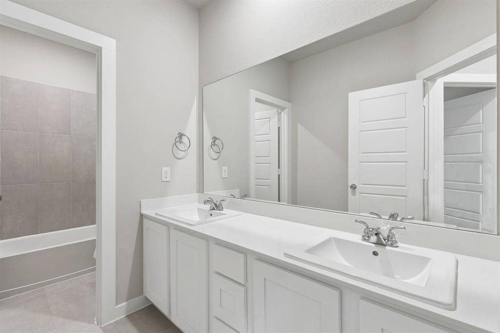Bathroom in the Winters home plan by Trophy Signature Homes – REPRESENTATIVE PHOTO