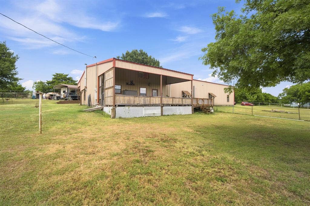 Plenty of room for playground or even a pool on this one acre lot!